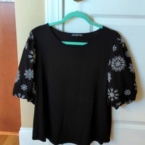 Adrianna Papell NEW black top with white floral embroidery on sleeves. Size XL